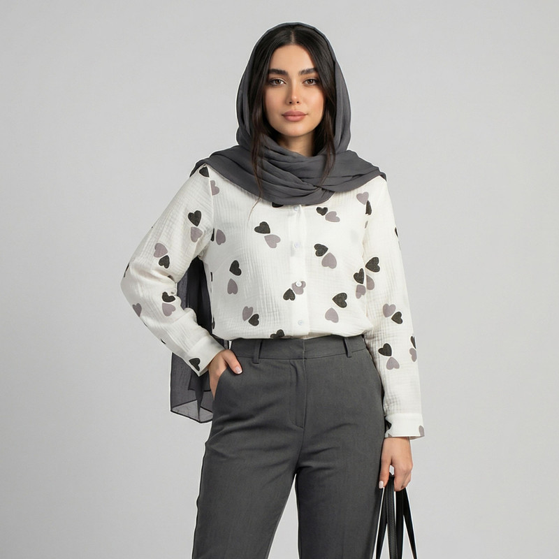 شومیز زنانه آستین بلند السانا مدل پارسانا با یقه برگردان، جنس لینن، طرح قلبی، بسته شدن با دکمه، تنخور آزاد، قد روی باسن، مناسب استفاده روزمره و مهمانی