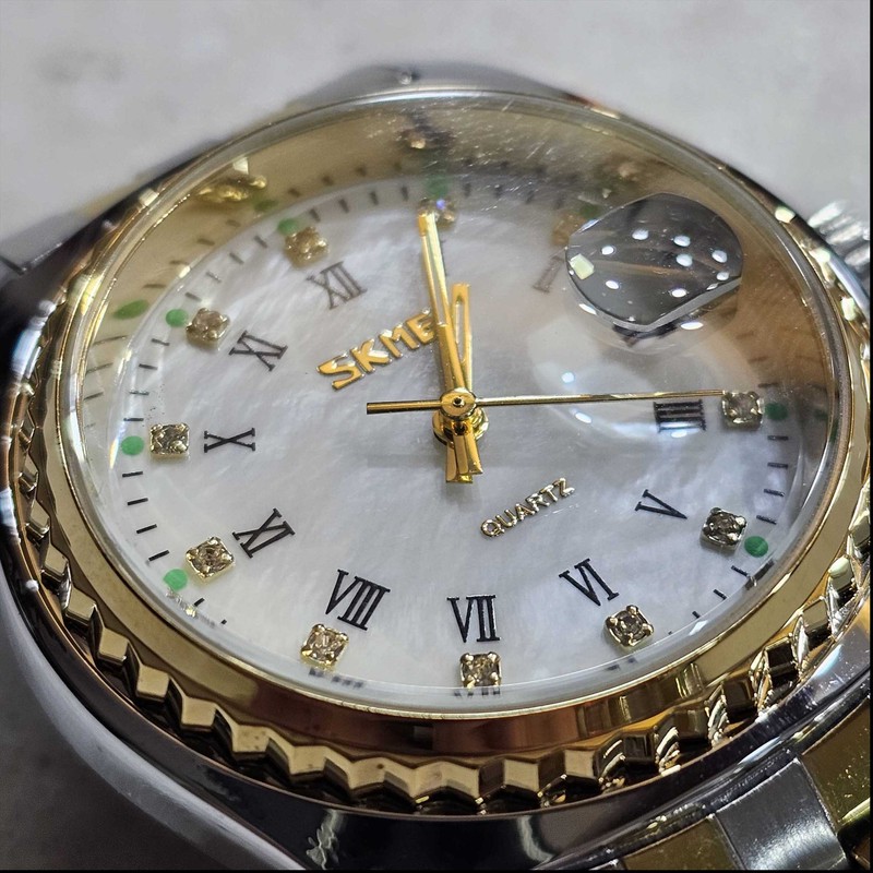 ست ساعت مچی عقربه ای کوارتز زنانه و مردانه اسکمی مدل 90-98 کد 05