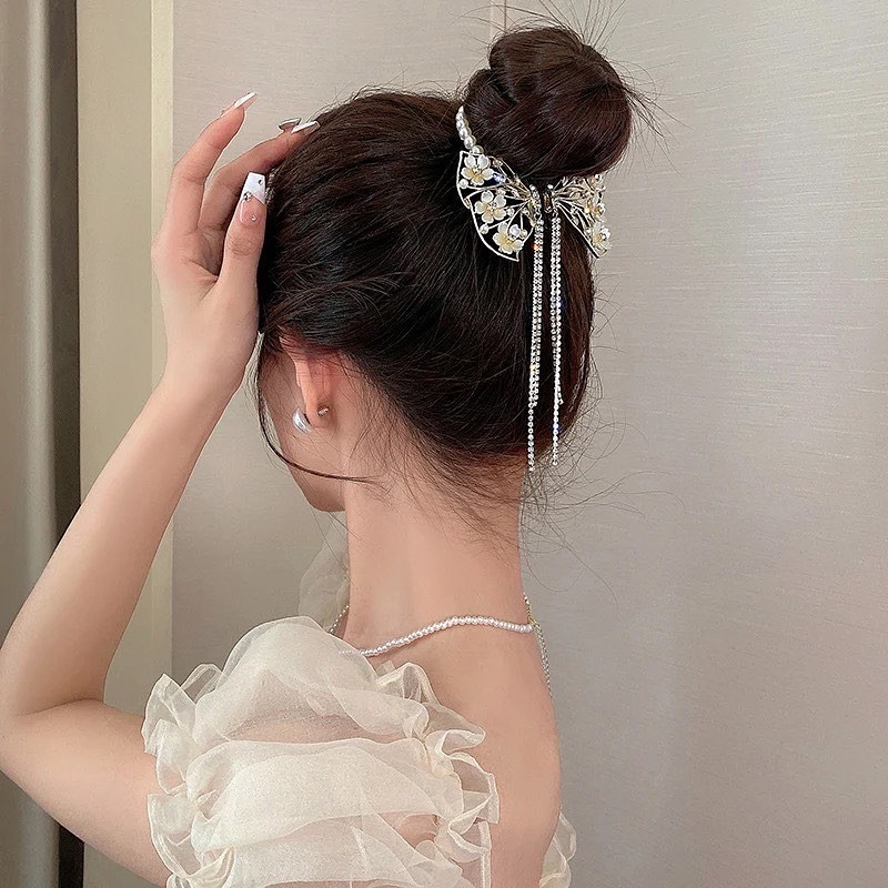 گیره مو زنانه مدل آبشاری گوجه ای طرح پاپیون آویزدار