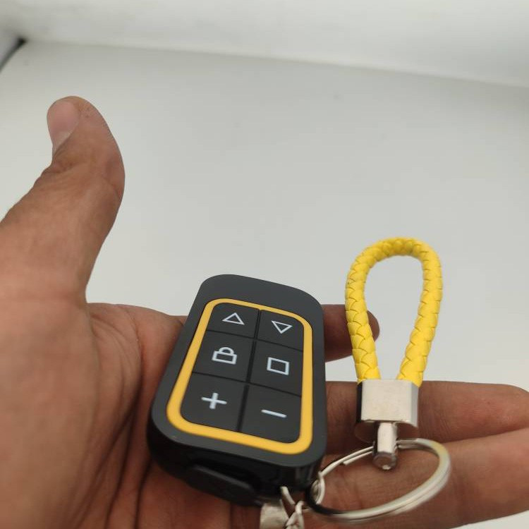 ریموت بلوتوثی دربازکن ژیلو مدل 8kanalz به همراه بند